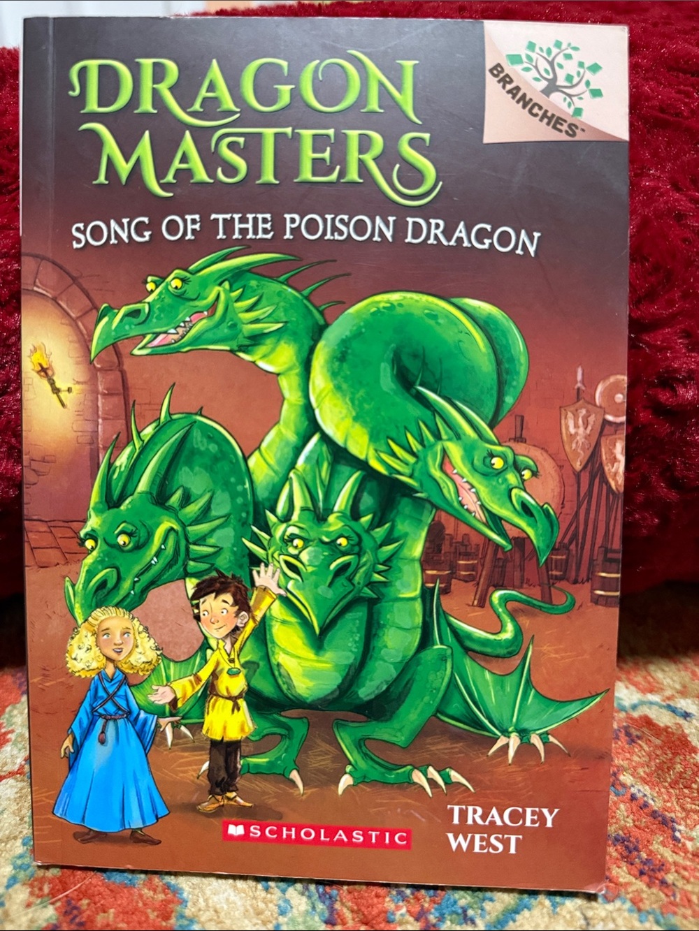 Dragon masters song of the poison dragon. By Tracy West